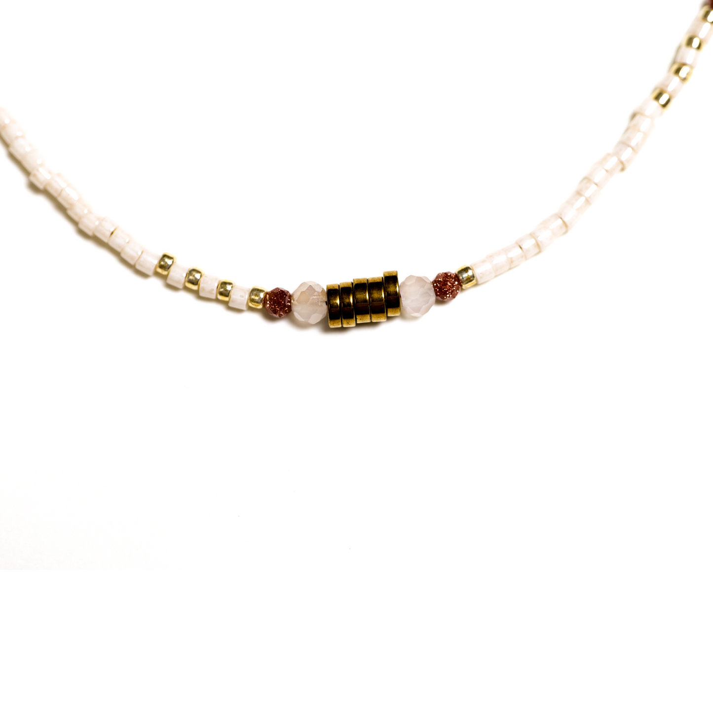 Elegant White Shell Bead Necklace with Golden Accents